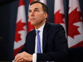 Finance Minister Bill Morneau speaks about the Trans Mountain Expansion project at a press conference in Ottawa on Wednesday.