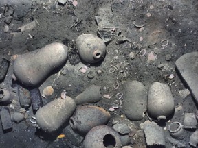 This November 2015 photo released Monday, May 21, 2018, by the Woods Hole Oceanographic Institution shows ceramic jars and other items from the 300-year-old shipwreck of the Spanish galleon San Jose on the floor of the Caribbean Sea off the coast of Colombia. New details about the discovery were released Monday with permission from the agencies involved in the search, including the Colombian government. Experts believe the ship's treasure is worth billions of dollars today. (Woods Hole Oceanographic Institution via AP)