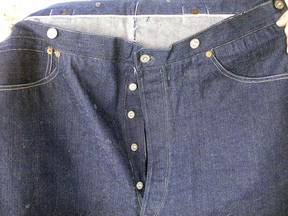 This undated photo provided by Daniel Buck Auctions, of Lisbon Falls, Maine, shows a portion of a pair of 125-year-old Levi Strauss & Co., denim blue jeans that sold for nearly $100,000 this in May 2018 to a buyer in Asia. The jeans were purchased in 1893 by a store keeper in the Arizona Territory and were in pristine condition because they were worn only a few times.