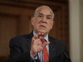The Secretary-General of the Organisation for Economic Co-operation and Development (OECD) Angel Gurria, from Mexico, speaks during an OECD press conference at the Treasury in London, Tuesday, Oct. 17, 2017.