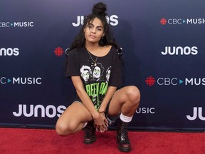 Jessie Reyez arrives on the red carpet at the Juno Awards in Vancouver, Sunday, March, 25, 2018. Canadian singer Jessie Reyez sings about her dreams of rising to the upper ranks of music and YouTube hopes its new marketing campaign will play a role getting her there.THE CANADIAN PRESS/Darryl Dyck
