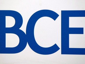 BCE Inc. logo is shown at the company's annual general meeting in Montreal on May 6, 2010. BCE Inc. reported its first-quarter profit and revenue increased compared with a year ago. The company says its profit attributable to shareholders totalled $661 million or 73 cents per share for quarter. That compared with a profit of $642 million or 73 cents per share a year ago, when the company had fewer shares outstanding.