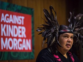 Rueben George, Project Manager for the Tsleil-Waututh Nation Sacred Trust Initiative, speaks as First Nations and environmental groups speak about a federal court hearing about the Kinder Morgan Trans Mountain pipeline expansion, during a news conference in Vancouver on October 2, 2017. Two Indigenous leaders from British Columbia say they will travel to pipeline builder Kinder Morgan's annual general meeting in Texas this week. Chief Judy Wilson with the Neskonlith Indian Band and Rueben George representing the Tsleil-Waututh Nation Sacred Trust Initiative say they intend to warn investors about the risk of proceeding with Kinder Morgan's Trans Mountain pipeline expansion without consent from First Nations.