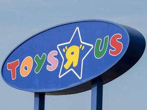 A Toys "R" Us sign is seen in Montreal on September 19, 2017. Spin Master says non-traditional toy retailers are fighting with existing retailers to pick up the slack of Toys R Us in the U.S.