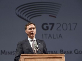 Finance Minister William Morneau speaks during the opening event of a G7 of Finance Ministers and Central Bank Governors meeting, in Bari, southern Italy, Thursday, May 11, 2017. Before all the attention turns to the G7's big show in Quebec next week, the finance lieutenants from the exclusive club of industrialized nations will have a more-peaceful setting to discuss global economic issues over the coming days in the fresh air of the British Columbia mountains.