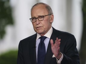 White House chief economic adviser Larry Kudlow speaks during a television interview outside the West Wing of the White House, in Washington, Friday, May 18, 2018.