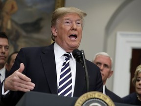 President Donald Trump speaks during a signing ceremony for the "Economic Growth, Regulatory Relief, and Consumer Protection Act," in the Roosevelt Room of the White House, Thursday, May 24, 2018, in Washington.  In a dramatic diplomatic turn, Trump on Thursday canceled next month's summit with North Korea's Kim Jong Un, citing the "tremendous anger and open hostility" in a recent statement by the North.
