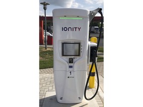 In this Friday, May 11, 2018 photo a Ionity charging station sits at the rest stop Brohltal Ost at the A61 motorway in Niederzissen, Germany. Munich-based Ionity build a highway network of fast charging stations that will let drivers plug in, charge in minutes instead of hours, and speed off on their way, from Norway to southern Italy and Portugal to Poland