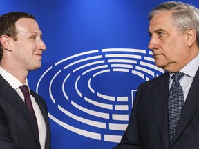 European Parliament President Antonio Tajani, right, welcomes Facebook CEO Mark Zuckerberg upon his arrival at the EU Parliament in Brussels on Tuesday, May 22, 2018. European Parliament President Antonio Tajani, right, welcomes Facebook CEO Mark Zuckerberg upon his arrival at the EU Parliament in Brussels, Tuesday, May 22, 2018.  European Union lawmakers plan to press Zuckerberg on Tuesday about data protection standards at the internet giant at a hearing focused on a scandal over the alleged misuse of the personal information of millions of people.