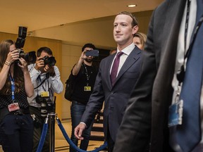 Facebook CEO Mark Zuckerberg leaves the EU Parliament in Brussels on Tuesday, May 22, 2018.  European Union lawmakers plan to press Zuckerberg on Tuesday about data protection standards at the internet giant at a hearing focused on a scandal over the alleged misuse of the personal information of millions of people.