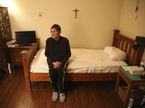 In this Wednesday, Jan. 25, 2017 file photo, Marsha Wetzel sits for a portrait in her room at Glen Saint Andrew Living Community in Niles, Ill. Wetzel moved into the senior apartment complex after her partner of 30 years died and her partner's family evicted her from the home the couple shared. She said she was met with relentless bullying by residents mostly focused on her being a lesbian.