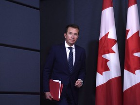 President of the Treasury Board Scott Brison, acting minister of democratic reform, arrives for a press conference on efforts to modernize Canada's federal elections in Ottawa on Monday, April 30, 2018.