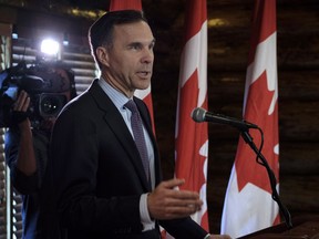Minister of Finance Bill Morneau speaks to the media in Calgary, Alta., Wednesday, May 30, 2018.THE CANADIAN PRESS/Jeff McIntosh