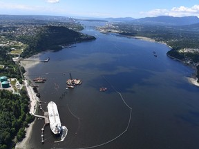 A aerial view of Kinder Morgan's Trans Mountain marine terminal, in Burnaby, B.C., is shown on Tuesday, May 29, 2018. The federal Liberal government is spending $4.5 billion to buy Trans Mountain and all of Kinder Morgan Canada's core assets, Finance Minister Bill Morneau said Tuesday as he unveiled the government's long-awaited, big-budget strategy to save the plan to expand the oilsands pipeline.THE CANADIAN PRESS Jonathan Hayward