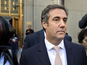 FILE - In this April 26, 2018 file photo, Michael Cohen leaves federal court in New York City. Porn actress Stormy Daniels' lawyer Michael Avenatti, said Monday, May 14, he did nothing wrong by distributing a report last week that detailed the finances of the president's personal attorney, Cohen, and showed he had charged companies a hefty price for "insight" about Trump.