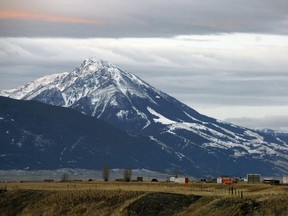 FILE - This Nov. 21, 2016 file photo shows Emigrant Peak towering over the Paradise Valley in Montana north of Yellowstone National Park. A gold exploration proposal in the area has suffered a significant setback after a judge ruled Montana officials understated mining's potential harm to land, water and wildlife.