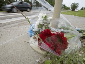 A roadside memorial marks where a pedestrian died. Such deaths have been rising in Canada.