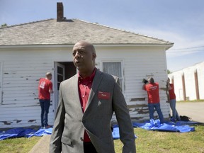 FILE- In this April 18, 2017, file photo, Marvin Ellison, CEO of J.C. Penney Co., visits the boyhood home of the company's founder James Cash Penney in Hamilton, Mo.  J.C. Penney's CEO is leaving the company to become the top executive at Lowe's. The announced departure of Ellison on Tuesday, May 22, 2018, sent shares of the besieged department store tumbling more than 12 percent to what may become an all-time low.