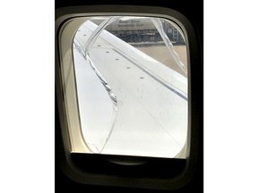 A crack is seen on a window of Southwest Airlines Flight 957 after an abrupt landing in Cleveland, Wednesday, May 2, 2018. The cracked window forced the Chicago to Newark, N.J., Flight 957 to land in Cleveland on Wednesday. There were no reports of injuries after the jet landed safely after making an abrupt turn toward Cleveland while over Lake Erie, according to tracking data from FlightAware.com.