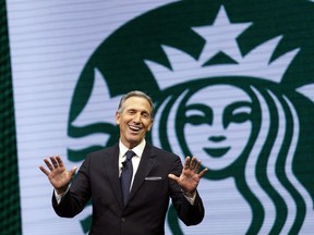 FILE - In this March 22, 2017 file photo, Starbucks CEO Howard Schultz speaks at the Starbucks annual shareholders meeting in Seattle. Schultz says the company will now allow people to use bathrooms at its coffee shops even if they don't buy anything, as it continues to take a closer look at its operations following the arrest of two black men at a Philadelphia shop. Schulz discussed the new policy while he spoke at the Atlantic Council in Washington, Thursday, May 10, 2018. Schultz said the company previously had a "loose policy" that only paying customers be allowed to use bathrooms, but that it was up to each store manager to decide.