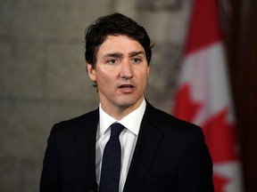 FILE - In an April 24, 2018 file photo, Prime Minister Justin Trudeau talks about the incident involving pedestrians being struck by a van in Toronto, in the Foyer of the House of Commons on Parliament Hill, in Ottawa, Ontario. Trudeau is scheduled to speak Friday, May 18, 2018, at a gathering of tech entrepreneurs at Massachusetts Institute of Technology. Massachusetts Institute of Technology officials say Trudeau will visit campus Friday to headline the annual meeting of the school's Solve initiative.