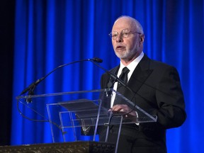 FILE - In this May 12, 2014, file photo, Paul Singer, founder and CEO of hedge fund Elliott Management Corporation, speaks at the Manhattan Institute for Policy Research Alexander Hamilton Award Dinner in New York. Prominent athenahealth investor Elliott Management Corp. is offering about $6.5 billion to take the medical billing software maker private after saying it has grown frustrated with the company's performance. Shares of athenahealth soared early Monday, May 7, 2018, after the shareholder outlined its proposal.