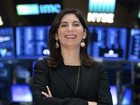 In this undated photo provided by the New York Stock Exchange, Stacey Cunningham poses for a photo at the Stock Exchange in New York. Cunningham, the chief operating officer for the NYSE group, will become the 67th president of the Big Board.
