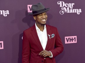 FILE - In this May 3, 2018, file photo, Ne-Yo arrives at the 3rd annual "Dear Mama: A Love Letter to Moms" at The Theatre at Ace Hotel in Los Angeles. Kevin Foster, of Montclair, N.J., is accused of running a multimillion dollar scam that bilked singers Ne-Yo and Brian McKnight who invested in a sports drink company.