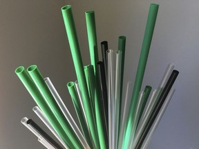 FILE- This May 23, 2018, file photo shows plastic drinking straws in New York. The European Union is proposing bans on plastic products like cotton buds, straws, stirs and balloon sticks when alternatives are easily available in an attempt to cut marine litter.