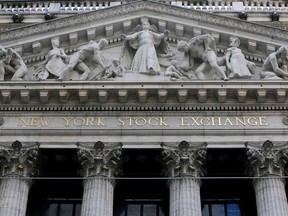 FILE- This April 5, 2018, file photo shows the facade of the New York Stock Exchange. The U.S. stock market opens at 9:30 a.m. EDT on Thursday, May 17.