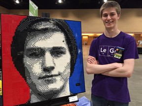 This June 2017 photo taken at Brickworld Chicago in Schaumburg, Ill., shows Chicago-area college student Casey McCoy and the self-portrait he created from more than 3,000 Lego bricks. Every June, Lego enthusiasts from around the world descend on Schaumburg, a northwestern suburb of Chicago, to build Legos, display Legos, play Legos, swap Legos, win Legos and more. This year's convention is June 13-17.