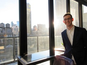 FILE - This March 2, 2017, file photo, shows then Lonely Planet CEO Daniel Houghton at a rooftop bar in in New York. Houghton took over the venerable travel publishing company Lonely Planet at age 24 in 2013. On Tuesday, May 8, 2018, the company said Houghton "has stepped away from Lonely Planet to take on a CEO role at another company."