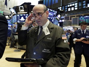 Trader Andrew Silverman works on the floor of the New York Stock Exchange, Tuesday, May 22, 2018. U.S. stocks are making modest gains as energy companies rise with oil prices and banks also move higher.