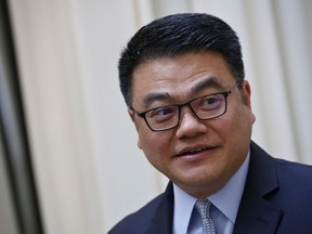 Seng Yee Lau , senior executive vice president of Tencent, China's biggest tech company, answers the Associated Press, in the Royal Monceau Hotel, in Paris, Thursday, May 24, 2018. Seng Yee Lau told The Associated Press that the industry needs to pay more attention to the risks posed by advancing technologies and the explosion in personal data circulating online.