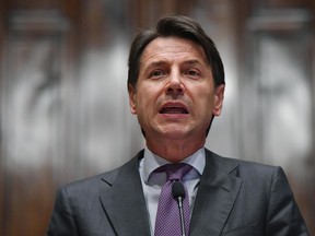 Premier-designate Giuseppe Conte addresses the media after a round of consultations to form the Cabinet ministers, in Rome, Thursday, May 24, 2018. Italy's premier-designate Giuseppe Conte spent his first day on the job Thursday finalizing his proposed cabinet list as European officials vowed to judge deeds, not words, from a decidedly euroskeptic and populist Italy in their ranks.