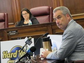 In this Wednesday, May 9, 2018 photo, Hard Rock International CEO James Allen testifies at a licensing hearing to for his company's casino in Atlantic City N.J. The New Jersey Casino Control Commission granted Hard Rock a casino license on Wednesday; the casino will open June 28.