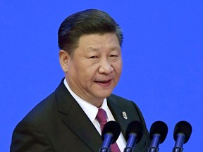 In this April 10, 2018, file photo, China's President Xi Jinping prepares to deliver his opening speech at the Boao Forum for Asia Annual Conference in Boao in south China's Hainan province. Chinese and American officials will be trying to defuse tensions pushing the world's two largest economies toward trade war in meetings in Beijing beginning Thursday, May 3, 2018. Analysts say that chances for a breakthrough seem slim given the two sides' desperate rivalry in strategic technologies such as semiconductors that underlies the dispute.