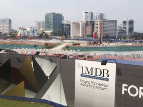 This May 9, 2015, photo shows state investment fund 1Malaysia Development Berhad's Tun Razak Exchange development in Kuala Lumpur, Malaysia. Malaysia's image as a striving, modern nation that upholds the rule of law has been undermined by an epic corruption scandal at state investment fund 1MDB. Prime Minister Najib Razak, who set up the fund, is facing May 9, 2018 national elections that will test his legitimacy.