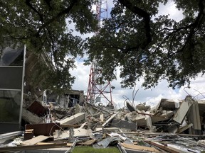 In this May 25, 2018, photo shows the former KHOU property on Allen Parkway in Houston. The Houston Chronicle reports the former KHOU-TV complex along Buffalo Bayou was sold to a group associated with funeral home and cemetery conglomerate Service Corporation International. The property is near SCI headquarters.