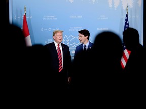 Prime Minister Justin Trudeau takes part in a meeting with U.S. President Donald Trump during the G7 Leaders Summit in La Malbaie, Que., on Friday, June 8, 2018.