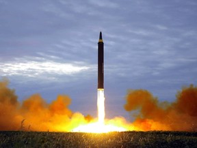 File photo from North Korea's official Korean Central News Agency (KCNA) taken on August 29, 2017 and released on August 30, 2017 shows North Korea's intermediate-range strategic ballistic rocket Hwasong-12 lifting off from the launching pad at an undisclosed location near Pyongyang.