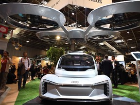 A flying car prototype, developed by Airbus and Audi, at an Airbus industrie exhibition.
