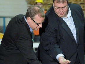 Murad Al-Katib, right, shows Saskatchewan's then-premier Brad Wall some of AGT's pulses.