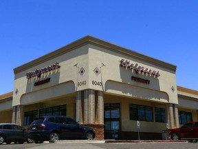 The Walgreens where Nicole Arteaga was allegedly refused service by a Walgreens pharmacist who denied her prescription because it was against his ethics, shown Monday, June 25, 2018, in Peoria, Ariz. The Arizona State Board of Pharmacy will investigate the complaint of a woman who says a Walgreens pharmacist denied to give her medication necessary to end her pregnancy after her baby stopped developing.