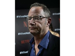 FILE - In this Aug. 2, 2017 file photo, Netflix Executive Communications Director Jonathan Friedland poses for photo during a red carpet event in Mexico City. Netflix CEO Reed Hastings says he fired the company's top spokesman over use of the N-word. The spokesman, Friedland, confirmed in tweets Friday, June 22, 2018, that he was leaving the company, saying he was insensitive in speaking with his team about words that offend in comedy.