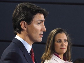 Prime Minister Justin Trudeau and Foreign Affairs Minister Chrystia Freeland speak at a press conference in Ottawa on Thursday, May 31, 2018. A new analysis of escalating trade disputes involving the United States warns that a deterioration into an all-out, global trade war would knock North America's economies into recession.