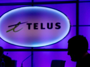 A Telus Corp. sign is shown at the telecom company's annual general meeting in Vancouver, B.C., on Thursday May 8, 2014. Canadian telecom companies are looking for regulatory clarity from the federal government as they prepare to unveil the next generation of wireless technology, the chief technology officer for Telus said Monday.