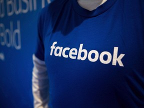 Guests are welcomed by people in Facebook shirts as they arrive at the Facebook Canadian Summit in Toronto on Wednesday, March 28, 2018. A senior executive of a B.C.-based technology firm is publicly fending off accusations from MPs that the company has misled a probe of Canadian connections to an international Facebook data controversy.