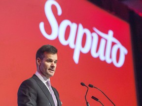 Newly appointed Saputo chief executive Lino Saputo Jr. speaks to shareholders at the dairy giant's annual meeting Tuesday, August 1, 2017 in Laval, Quebec.