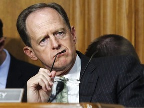Sen. Patrick Toomey, R-Penn., listens to Secretary of Commerce Wilbur Ross during a Senate Finance Committee hearing on tariffs, on Capitol Hill, Wednesday, June 20, 2018 in Washington. When Sen.Toomey looks at the future of the ketchup market in his home state of Pennsylvania, he sees real blood on the floor. On Sunday, Canada's $16.6-billion worth of retaliatory tariffs on dozens of U.S. products is set to kick in ??? the country's answer to the crushing steel and aluminum tariffs imposed by the Trump administration.THE CANADIAN PRESS/AP Photo/Jacquelyn Martin